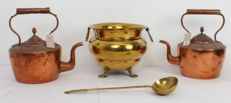 Two large copper kettles (33 cm high), a brass cauldron and a ladle. (4)