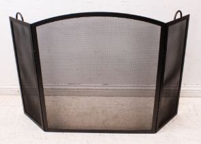 A modern painted steel three-fold fire screen - arched with mesh screen, the frame with twin hoop