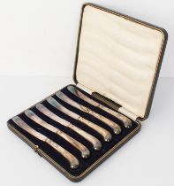 A cased set of six hallmarked silver fruit knives by C.T. Burrows & Sons, assayed Sheffield 1919