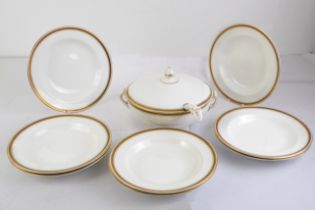 A John Maddock & Sons 'Royal Vitreous' white glazed soup tureen, ladle and bowls - early 20th