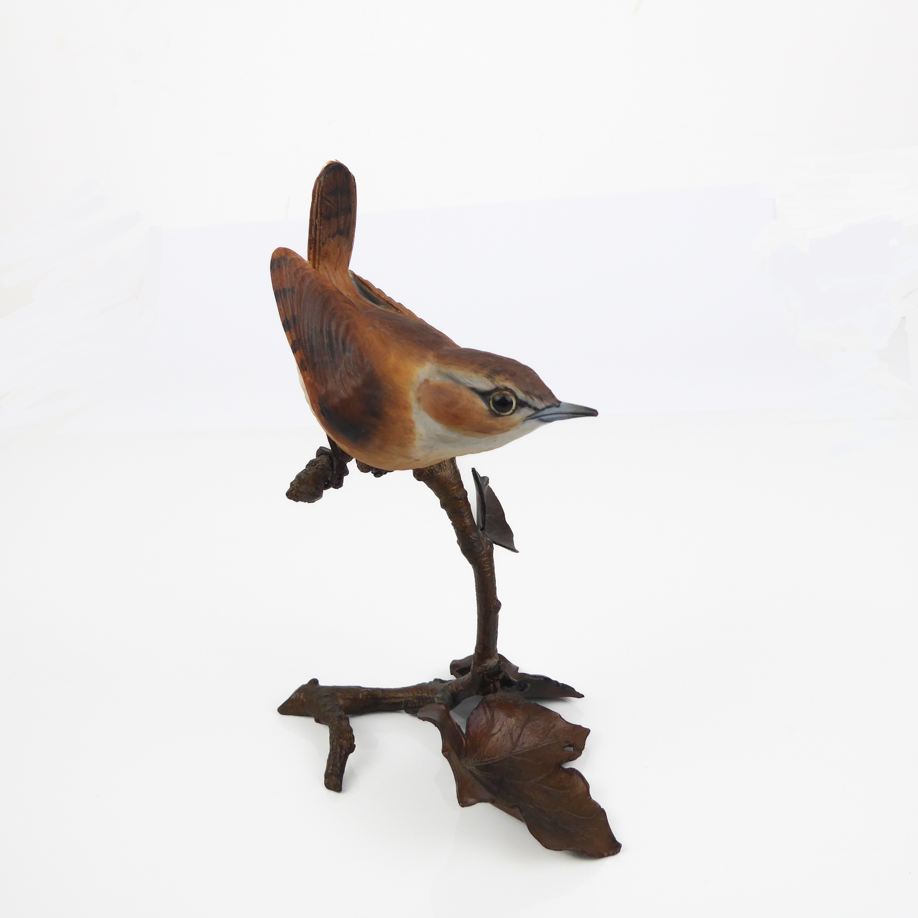 A 20th century cold painted bronze model of a wren setting upon a branch. - Image 2 of 4