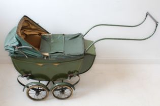 A rare Fetha-Lite dolls pram: 1920s-30s, in remarkable original condition, the mid-green coachwork