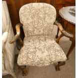 LATE 19TH CENTURY WALNUT OPEN ARMCHAIR WITH DECORATIVE CARVING ON BALL & CLAW SUPPORTS