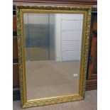 BEVELLED EDGE MIRROR IN GILT FRAME,