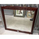 MAHOGANY FRAMED MIRROR WITH DECORATIVE CARVED FRAME SIZE OF GLASS: 55 X 67 CMS