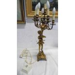 7 BRANCH BRASS TABLE TOP LIGHT FITTING OF A YOUNG WOMAN HOLDING THE BRANCH OF 7 LIGHT FITTINGS,
