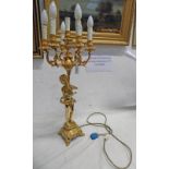 7 BRANCH BRASS TABLE TOP LIGHT FITTING OF A YOUNG WOMAN HOLDING THE BRANCH OF 7 LIGHT FITTINGS,