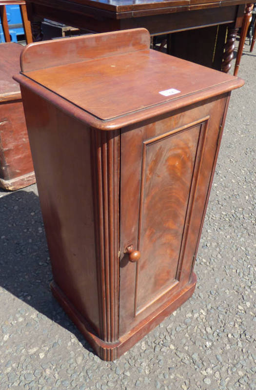 LATE 19TH CENTURY MAHOGANY CABINET WITH PANEL DOOR ON PLINTH BASE,