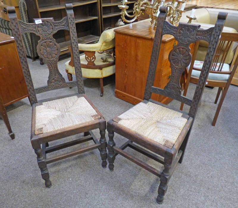 PAIR 19TH CENTURY CARVED OAK HALL CHAIRS WITH ROPEWORK DECORATION 106 CM TALL