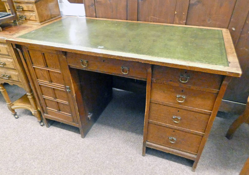 LATE 19TH CENTURY OAK KNEE-HOLE DESK WITH LEATHER INSET TOP, 5 DRAWERS & PANEL DOOR,