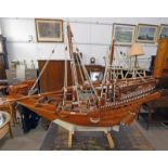 WOODEN DHOW WITH CARVED DECORATION,