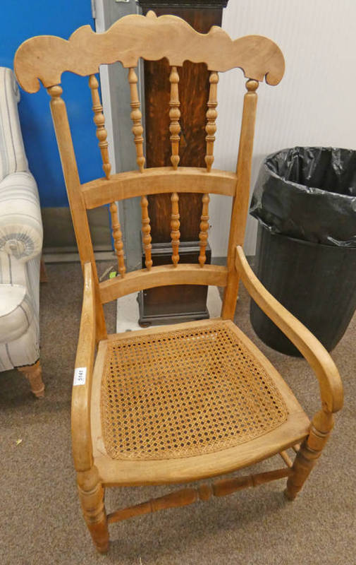 ARTS & CRAFTS STYLE OAK TALL BACK OPEN ARMCHAIR WITH BERGERE SEAT ON TURNED SUPPORTS