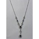 18CT GOLD & DIAMOND NEGLIGEE PENDANT NECKLACE SET WITH CLUSTERS OF CENTRAL SAPPHIRES WITHIN A