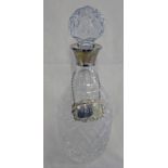 SILVER MOUNTED CUT GLASS DECANTER,