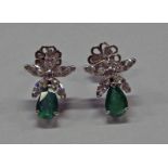 PAIR OF 18CT GOLD EMERALD & DIAMOND EARRINGS WITH A PEAR SHAPED EMERALD SET BELOW A FLOWER HEAD