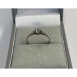 PLATINUM SET DIAMOND SINGLE STONE RING WITH DIAMOND SET SHOULDERS, THE PRINCIPAL DIAMOND APPROX 0.