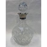 SILVER MOUNTED CUT GLASS DECANTER,