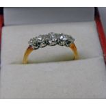 DIAMOND SET 5 STONE RING IN SETTING MARKED 18CT., APPROX. 0.