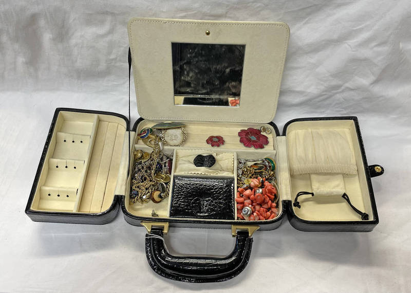 BLACK LEATHER HANDBAG STYLE JEWELLERY BOX AND CONTENTS OF DECORATIVE JEWELLERY INCLUDING ENAMEL