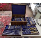 OAK CASED CANTEEN OF SILVER PLATED CUTLERY IN 3 TRAYS WITH BRASS CARRY HANDLES