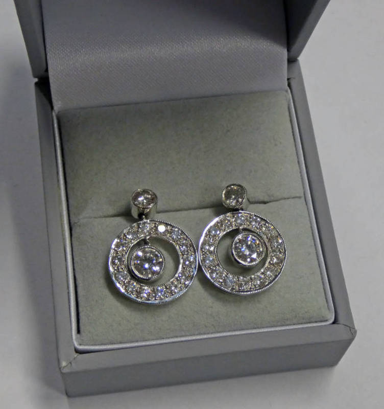 PAIR OF 18CT GOLD DIAMOND SET EARRINGS WITH CENTRAL DIAMOND SET WITHIN A SURROUND OF DIAMONDS