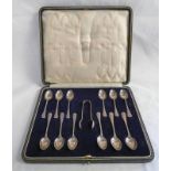 CASED SET OF 12 SILVER TEASPOONS & SUGAR TONGS,