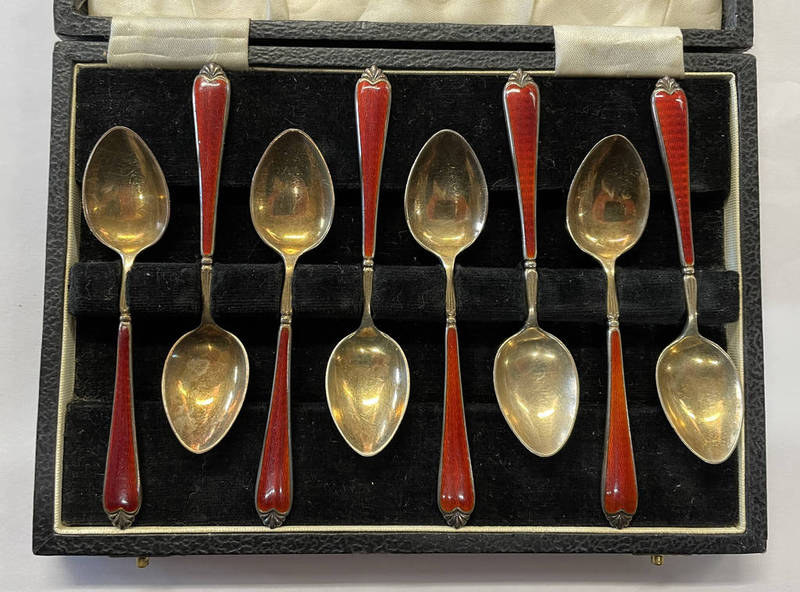 CASED SET OF 8 SILVER GILT & RED ENAMEL COFFEE SPOONS BY ADIE BROS,