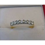 18CT GOLD 7-STONE DIAMOND SET RING, APPROX. 0.