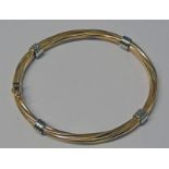 9CT GOLD HINGED TWIST BANGLE - 6.2 CM INNER DIAMETER, 12.