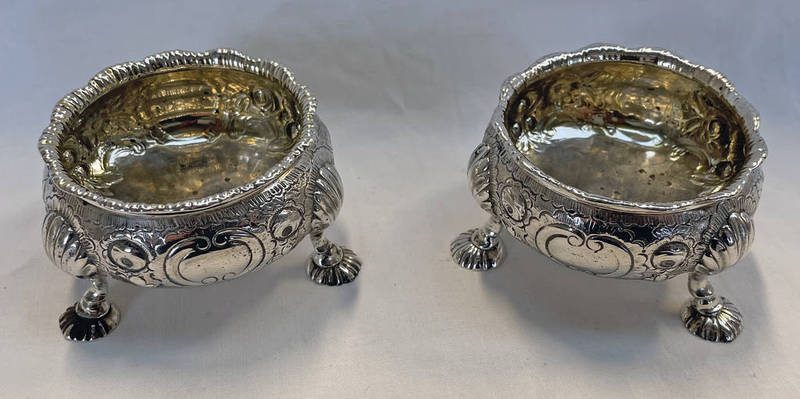 PAIR OF GEORGE III SILVER SALT CELLARS WITH FRUIT DECORATION & 3 PAD FEET,