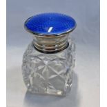 SILVER MOUNTED FACETED GLASS SCENT BOTTLE WITH BLUE ENAMEL TOP,