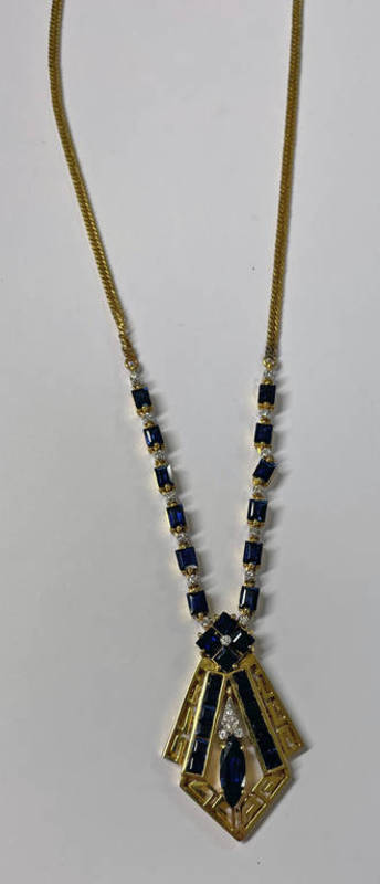 18CT GOLD SAPPHIRE & DIAMOND SET PENDANT ON AN 18CT GOLD CHAIN - 17.