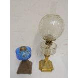 PARAFFIN LAMP WITH CLEAR GLASS RESERVOIR AND A BLUE RESERVOIR PARAFFIN LAMP