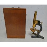 BAUSCH & LOMB OPTICAL CO MICROSCOPE WITH LACQUERED BRASS SECTIONS,