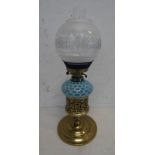 BRASS BODIED AND BLUE GLASS RESERVOIR PARAFFIN LAMP WITH ETCHED SHADE Condition Report: