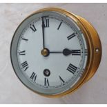 F W ELLIOTT LTD, BULK HEAD CLOCK WITH MARKINGS TO REAR TO INCLUDE BROAD ARROW AND 1973,