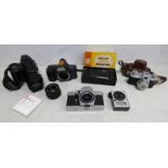 OLYMPUS 15-3000 CAMERA, ED/35-180MM LENS WITH HAND STRAP, PRAKTICA LTL 3 CAMERA WITHOUT LENS,