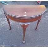 MAHOGANY DEMI-LUNE GAMES TABLE WITH DRAWER TO BACK ON BALL & CLAW SUPPORTS,