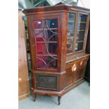 LATE 19TH CENTURY MAHOGANY CORNER CUPBOARD WITH ASTRAGAL GLASS DOOR OVER CARVED PANEL DOOR ON