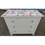 CHEST OF 3 LONG DRAWERS ON SQUARE SUPPORTS WITH DECORATIVE WORK VEHICLES THEMED TOP 97 CM TALL X