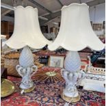 PAIR OF WHITE PORCELAIN PINEAPPLE TABLE LAMPS ON TURNED GILT BASES AND WITH SHADES 90CM TALL