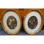 2 OVAL GILT FRAMED OIL PAINTINGS OF FLOWERS BOTH WITH THE NAME WILLIAM SCHMALTZ 1944 TO REVERSE,