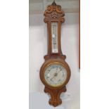 EARLY 20TH CENTURY CARVED OAK WALL BAROMETER