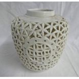 20TH CENTURY PIERCED WORK CHINESE STYLE WHITE PORCELAIN VASE WITH MADE IN HONG KONG STAMPED TO BASE.