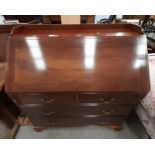 MAHOGANY BUREAU WITH FALL FRONT OVER 2 SHORT & 2 LONG DRAWERS ON BRACKET SUPPORTS,