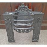 19TH CENTURY PAINTED CAST IRON FIRE GRATE WITH VICTORIA LOZENGE MARK TO BACK.