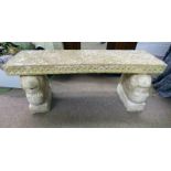 RECONSTITUTED STONE GARDEN BENCH ON 2 LION MASK PEDESTALS,