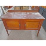 LATE 19TH CENTURY INLAID MAHOGANY WASH STAND WITH 2 PANEL DOORS ON SQUARE TAPERED SUPPORTS.