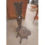 EBONISED SPINNING CHAIR WITH DECORATIVE CARVING ON TURNED SUPPORTS