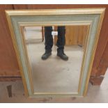 GILT FRAMED BEVELLED EDGE RECTANGULAR MIRROR.